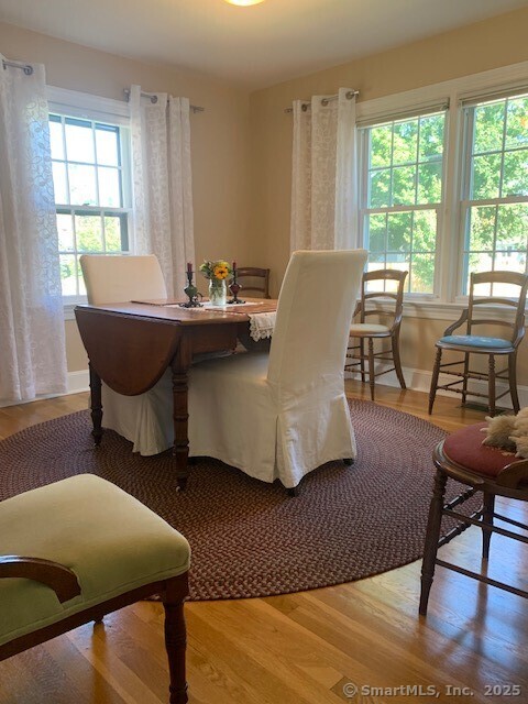 345 Courtland Avenue Bridgeport, CT 06605 - Photo 6 of 38 a living room with furniture and a large window