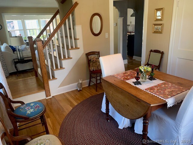 345 Courtland Avenue Bridgeport, CT 06605 - Photo 7 of 38 a view of a livingroom with furniture wooden floor and a rug