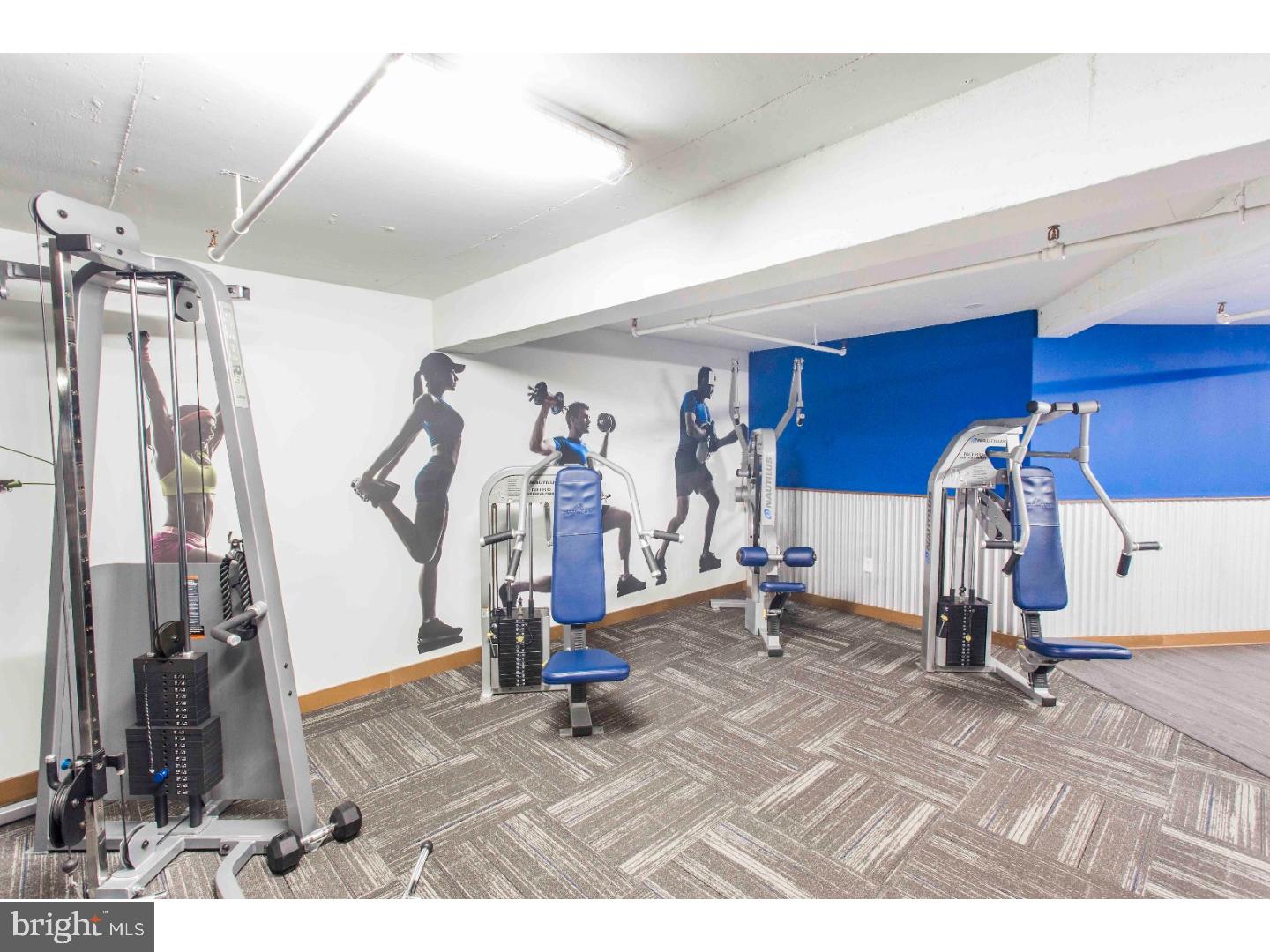 2201 Pennsylvania Avenue, Unit 1112 Philadelphia, PA 19130 - Photo 26 of 45 a view of a room with gym equipment