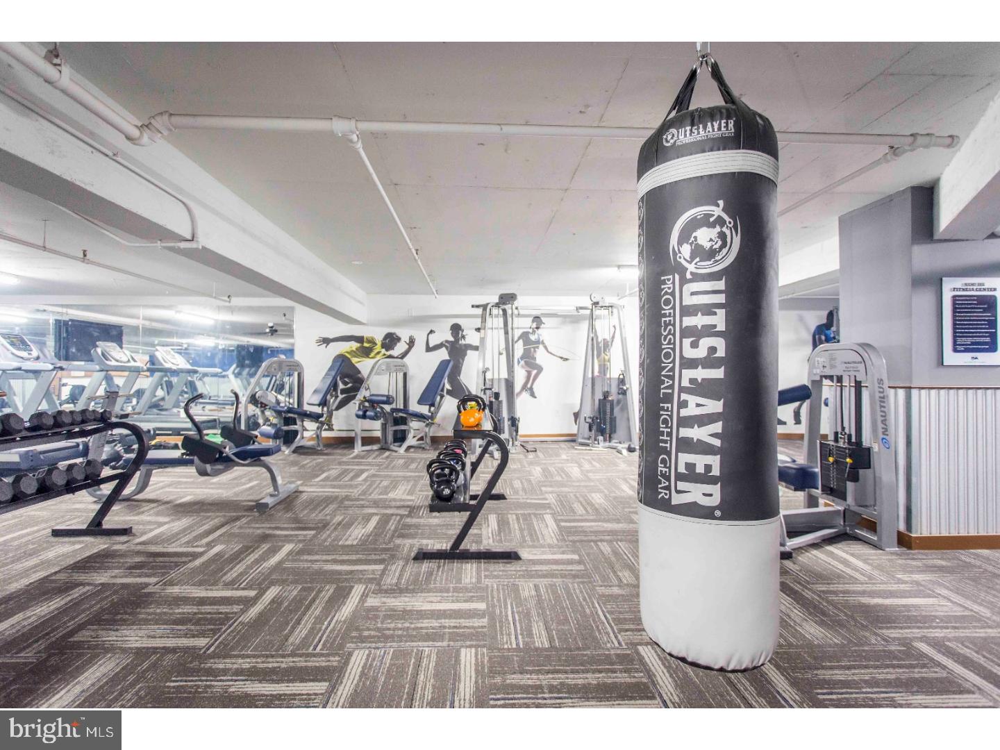 2201 Pennsylvania Avenue, Unit 1112 Philadelphia, PA 19130 - Photo 27 of 45 a view of a room with gym equipment