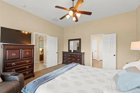 a bedroom with a bed and furniture