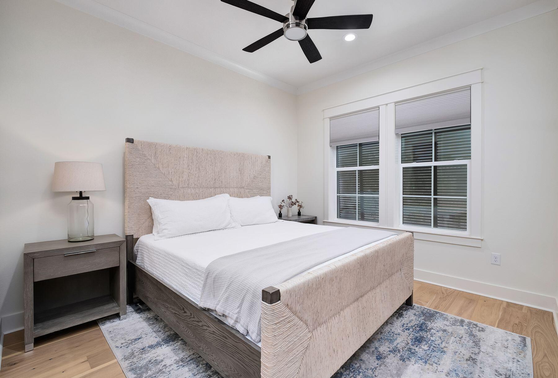 1979 Baytowne Loop Miramar Beach, FL 32550 - Photo 17 of 35 a bedroom with a large bed and a window