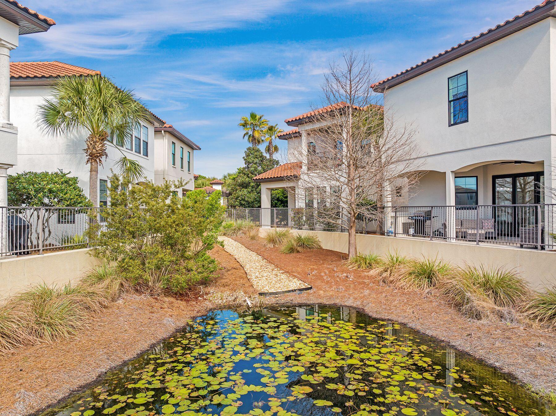 1979 Baytowne Loop Miramar Beach, FL 32550 - Photo 29 of 35 a view of a house with a yard