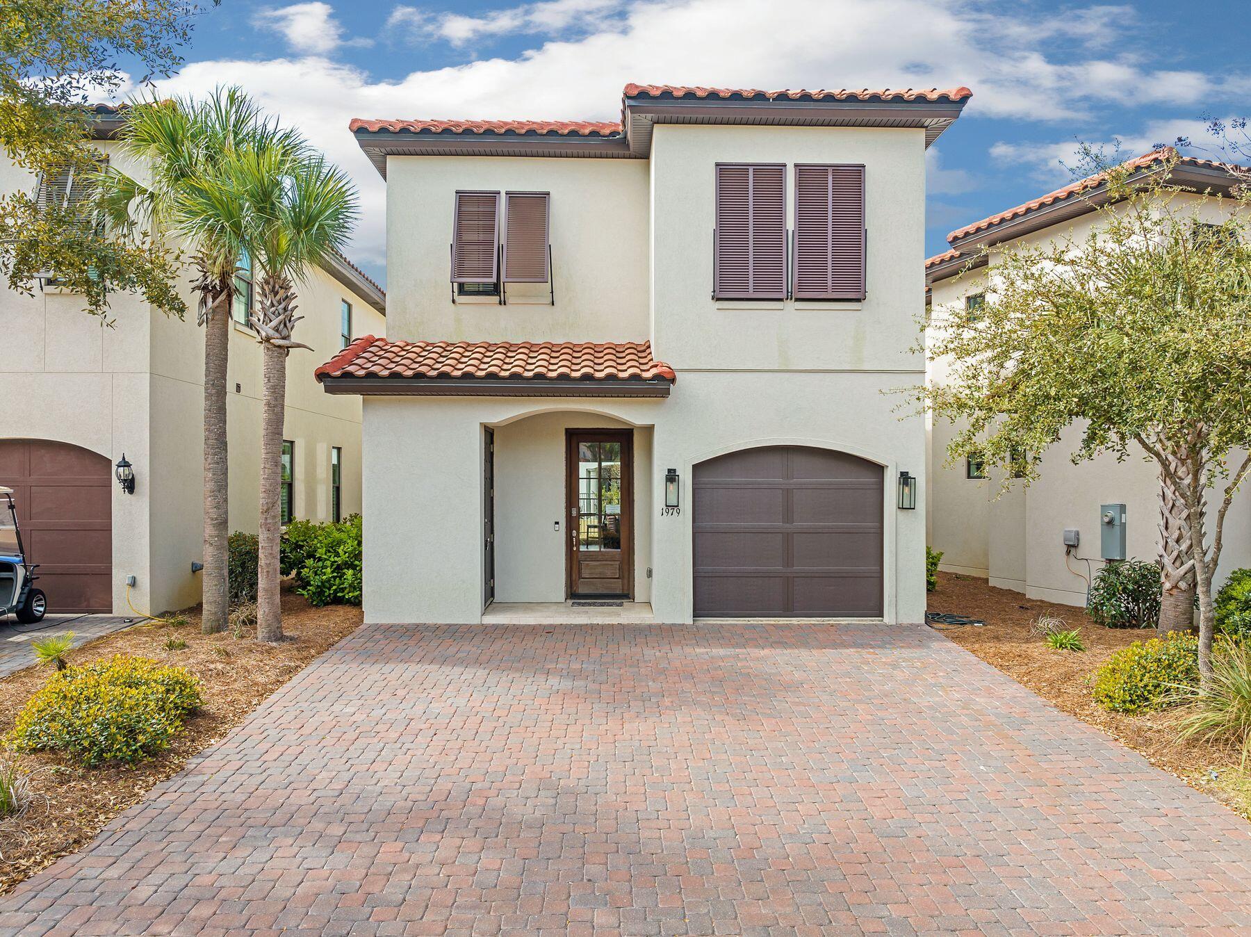 1979 Baytowne Loop Miramar Beach, FL 32550 - Photo 31 of 35 a front view of a house with a garden