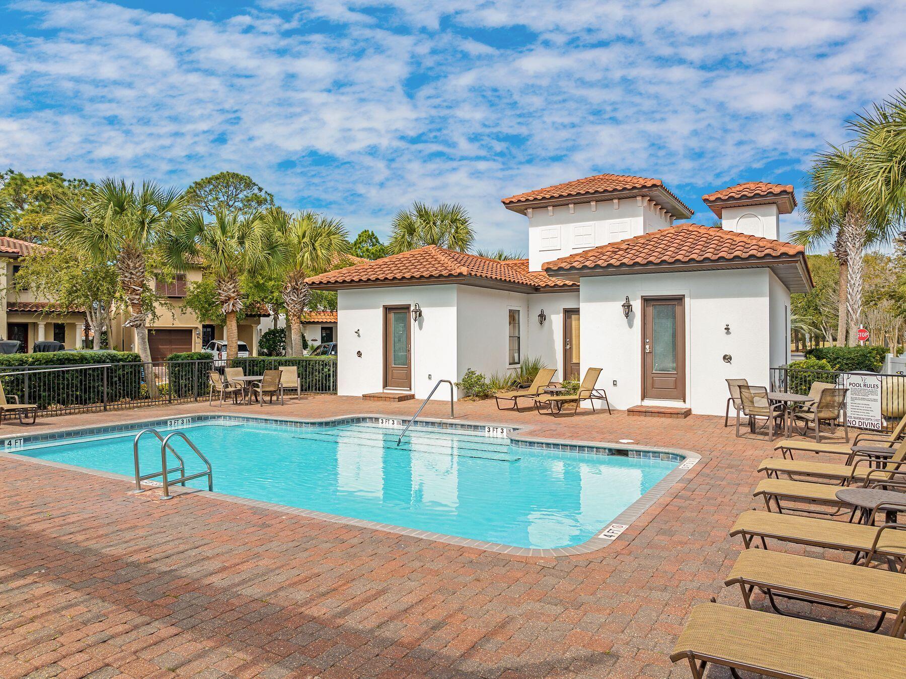 1979 Baytowne Loop Miramar Beach, FL 32550 - Photo 32 of 35 a view of a house with swimming pool and sitting area