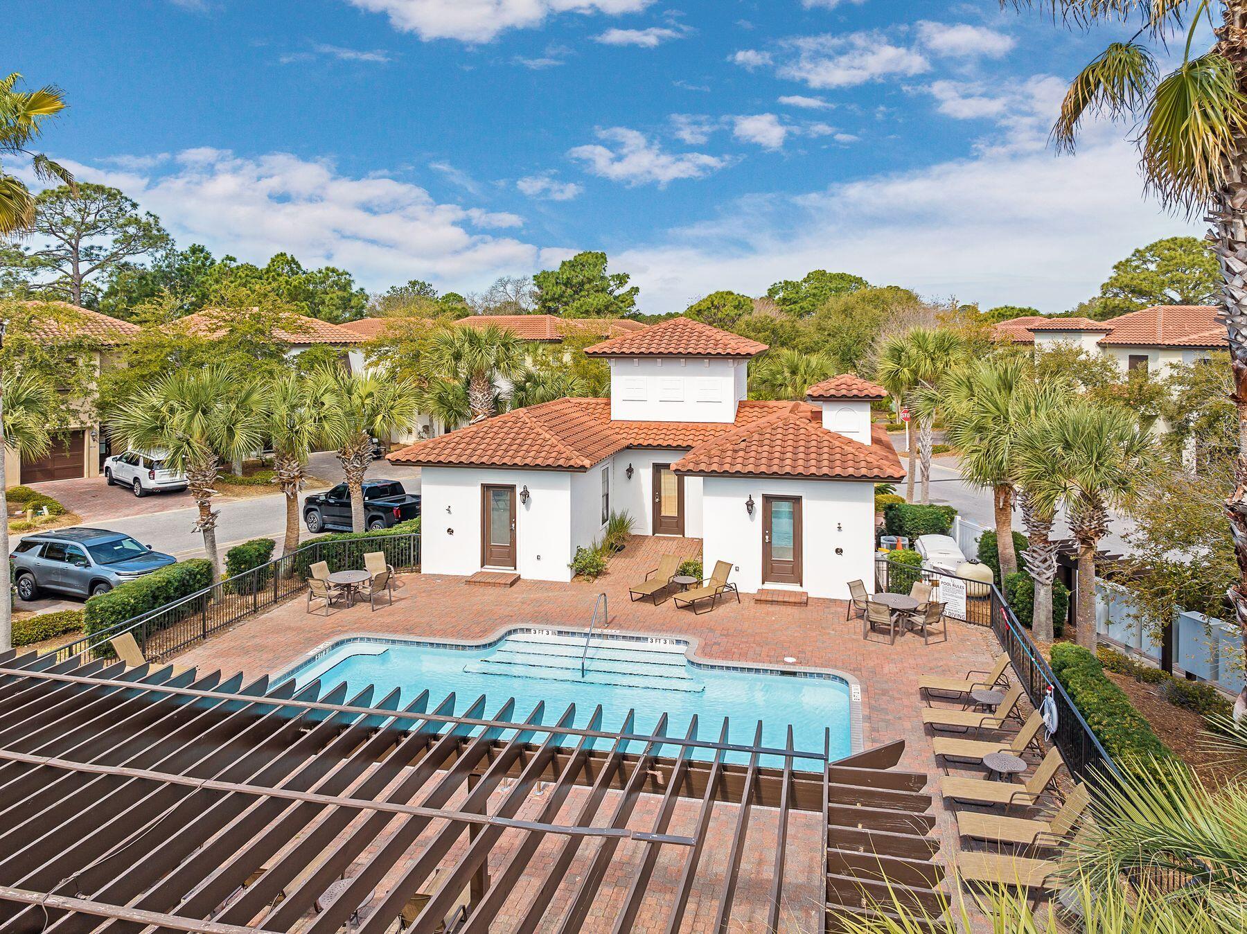 1979 Baytowne Loop Miramar Beach, FL 32550 - Photo 33 of 35 a view of a house with backyard and sitting area