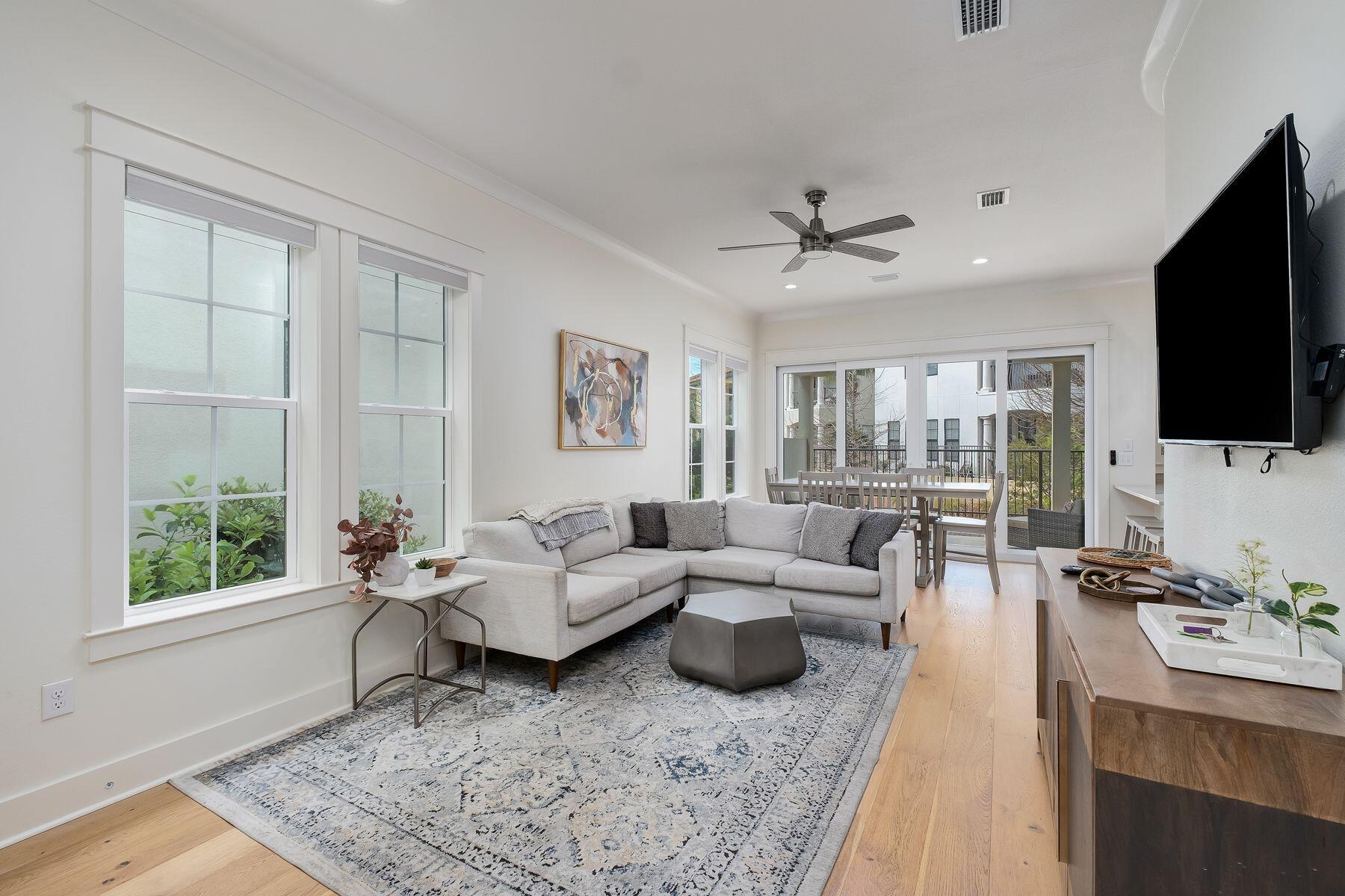 1979 Baytowne Loop Miramar Beach, FL 32550 - Photo 8 of 35 a living room with furniture and a flat screen tv
