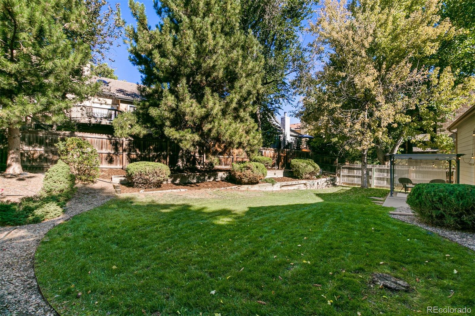 8035 Sweet Water Road Lone Tree, CO 80124 - Photo 32 of 36 a view of a park with large trees