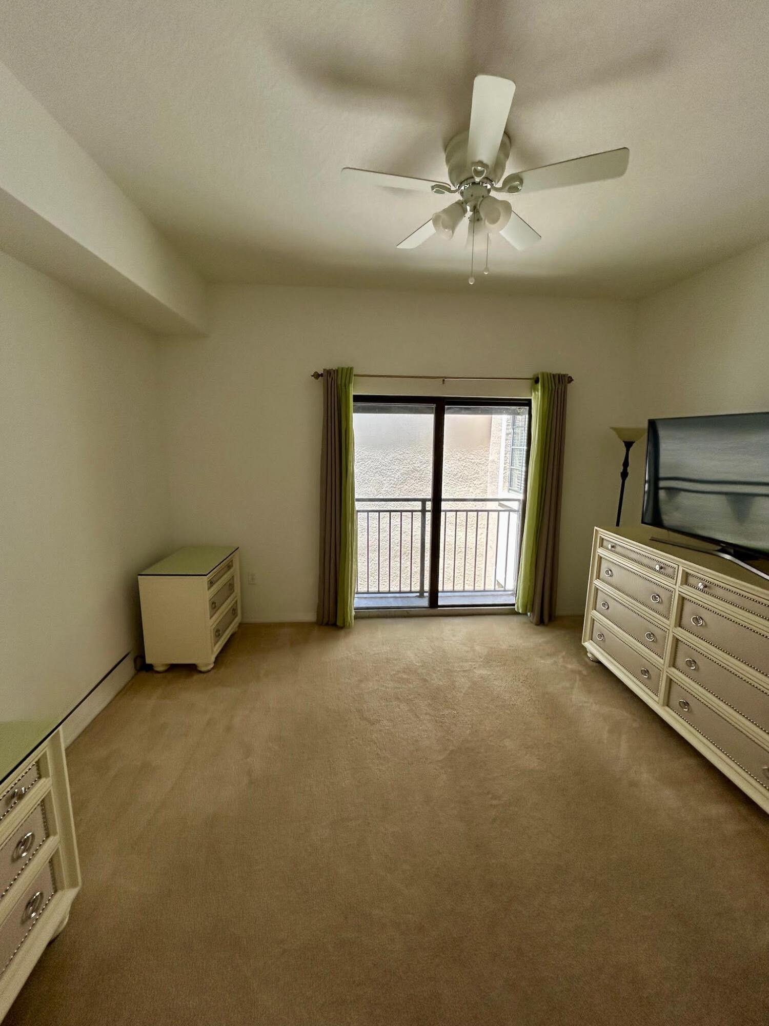 4905 Midtown Lane, Unit 2405 Palm Beach Gardens, FL 33418 - Photo 16 of 28 a view of an empty room with a fireplace