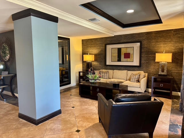 4905 Midtown Lane, Unit 2405 Palm Beach Gardens, FL 33418 - Photo 22 of 28 a living room with furniture