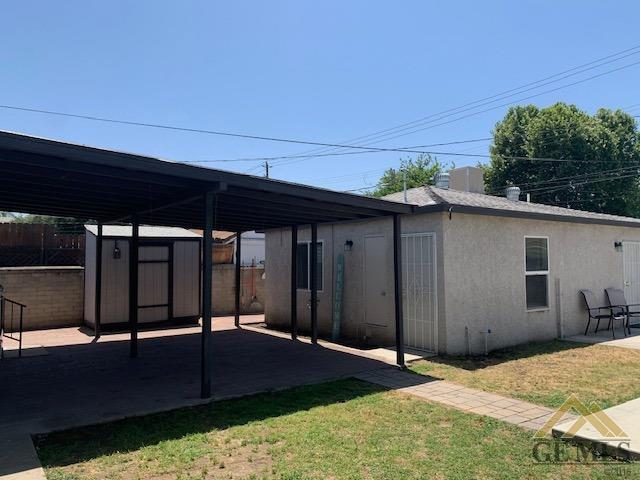 Undisclosed Address Bakersfield, CA 93304 - Photo 28 of 32 a backyard of a house with shaded area
