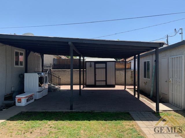 Undisclosed Address Bakersfield, CA 93304 - Photo 29 of 32 a view of a patio with table and chairs