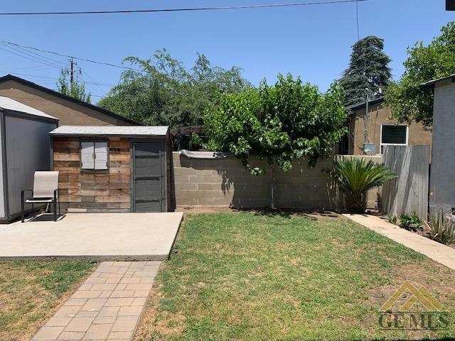 Undisclosed Address Bakersfield, CA 93304 - Photo 30 of 32 a view of a backyard with plants and tree
