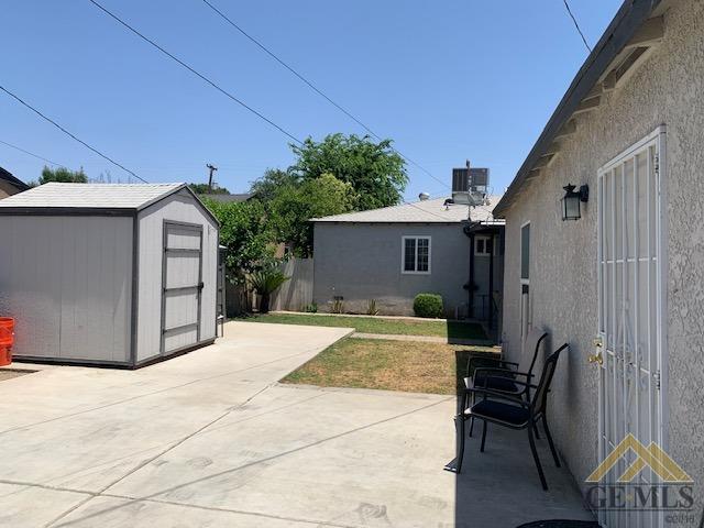 Undisclosed Address Bakersfield, CA 93304 - Photo 32 of 32 a view of a house with backyard and sitting area