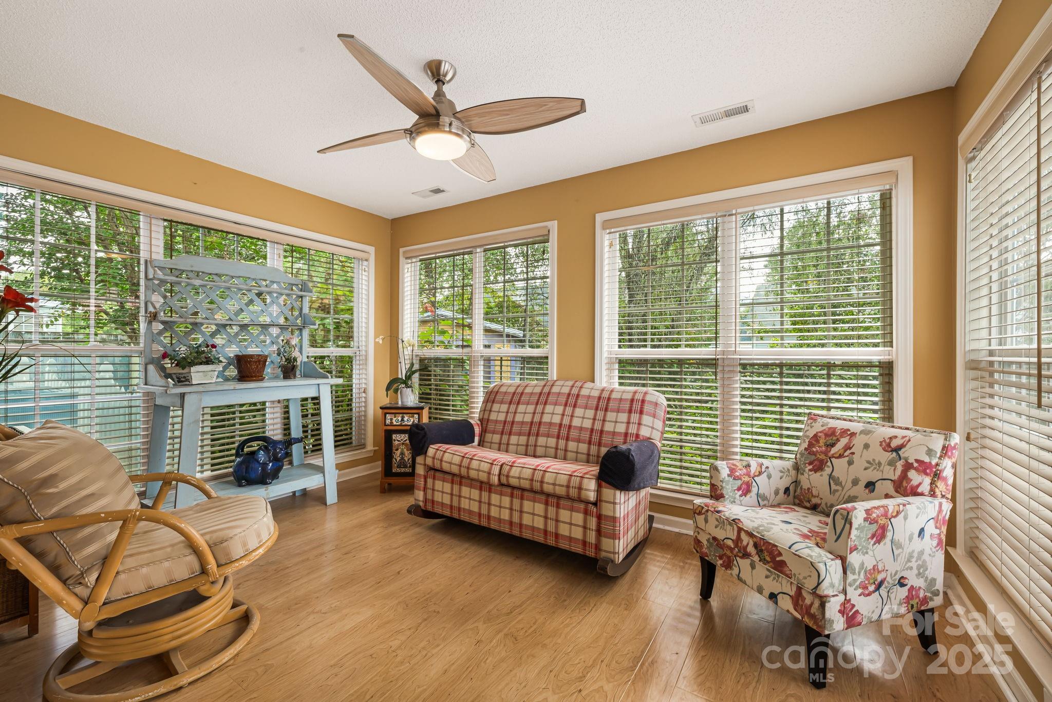107 South Sunberry Trail Fletcher, NC 28732 - Photo 13 of 30 a living room with furniture and floor to ceiling windows