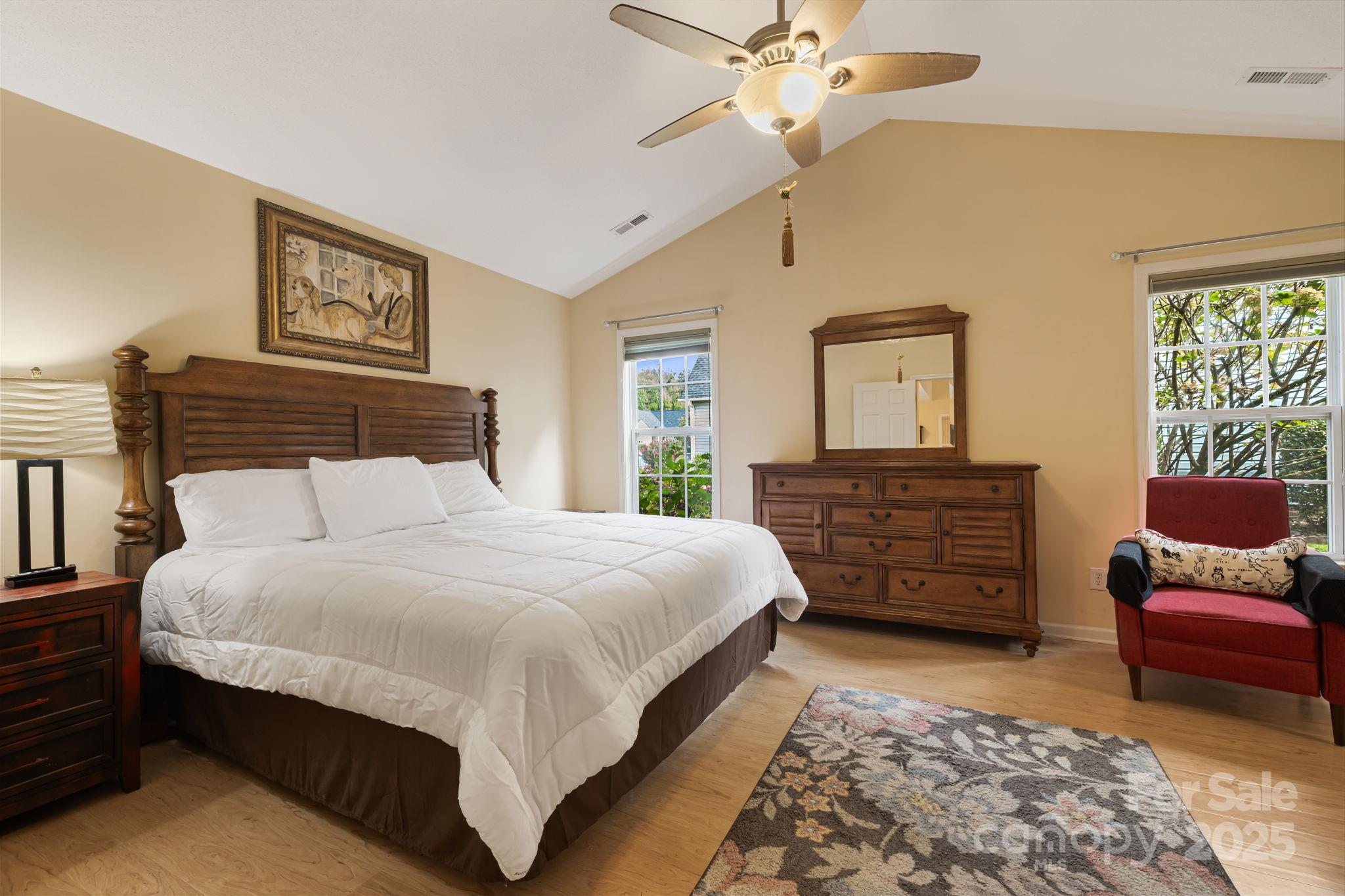 107 South Sunberry Trail Fletcher, NC 28732 - Photo 17 of 30 a bedroom with a bed and dresser