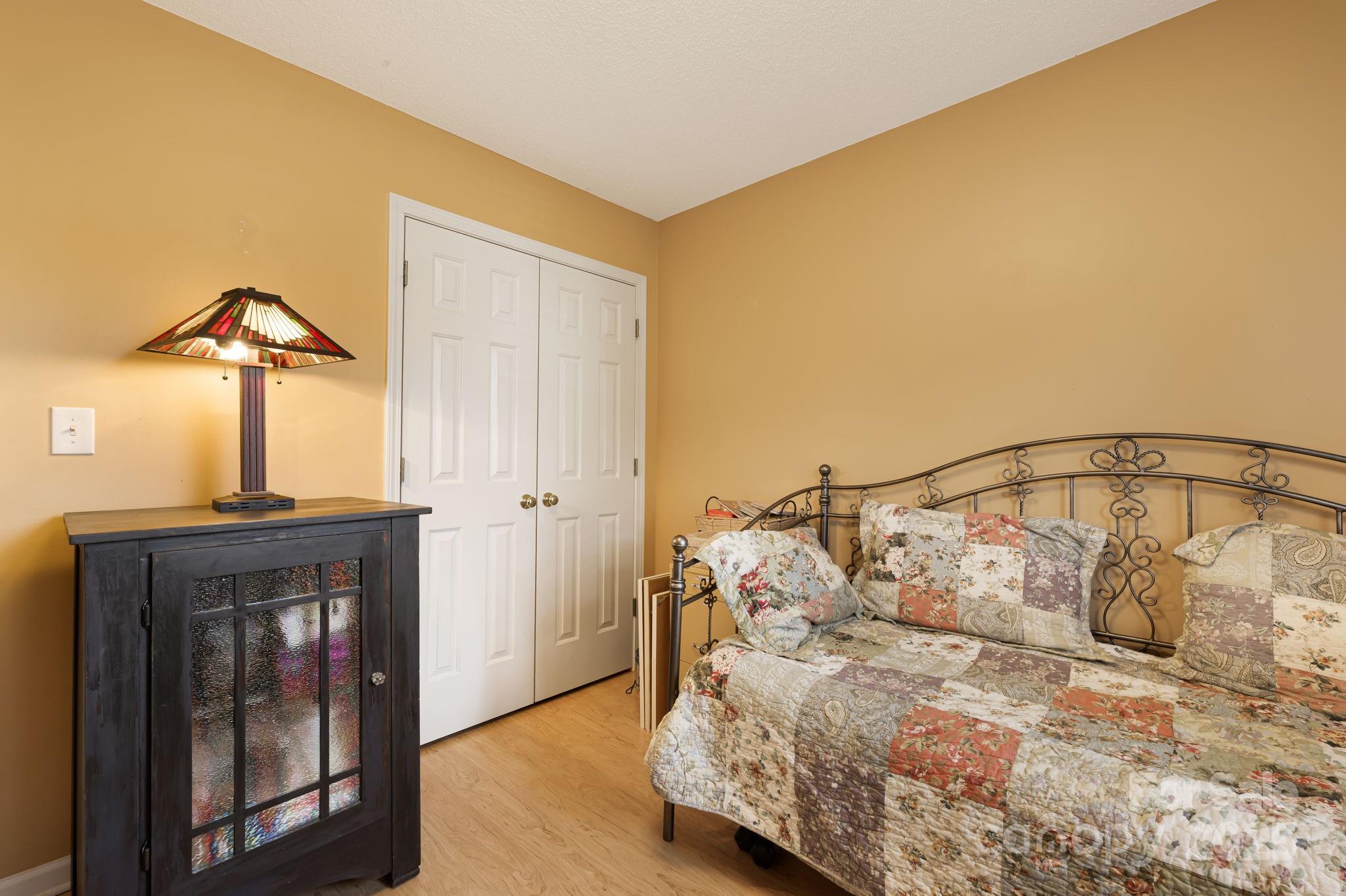 107 South Sunberry Trail Fletcher, NC 28732 - Photo 22 of 30 a bed room with a bed and a window