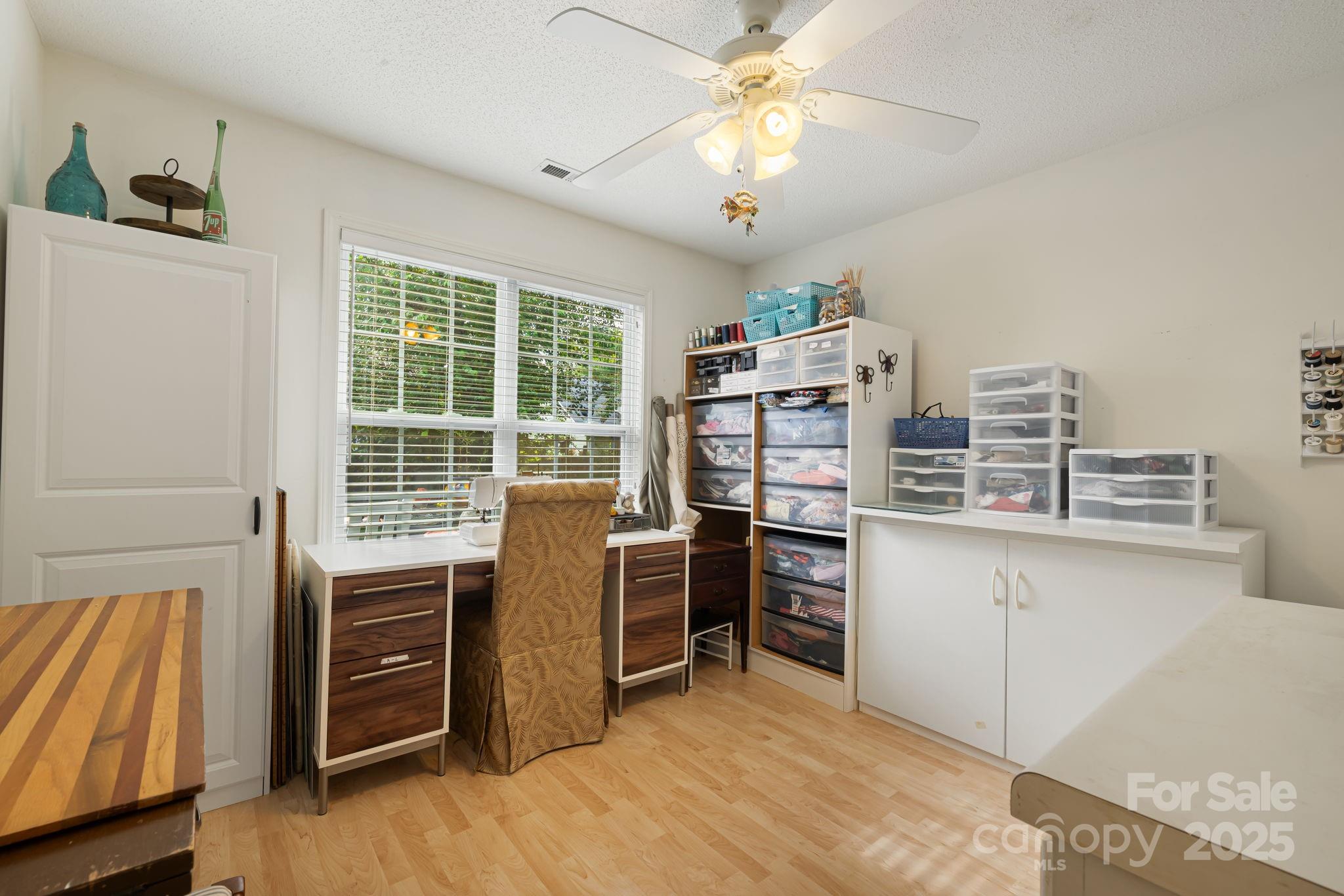 107 South Sunberry Trail Fletcher, NC 28732 - Photo 24 of 30 a view of a workspace with furniture and a window