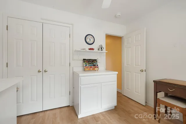a view of an entryway with wooden floor