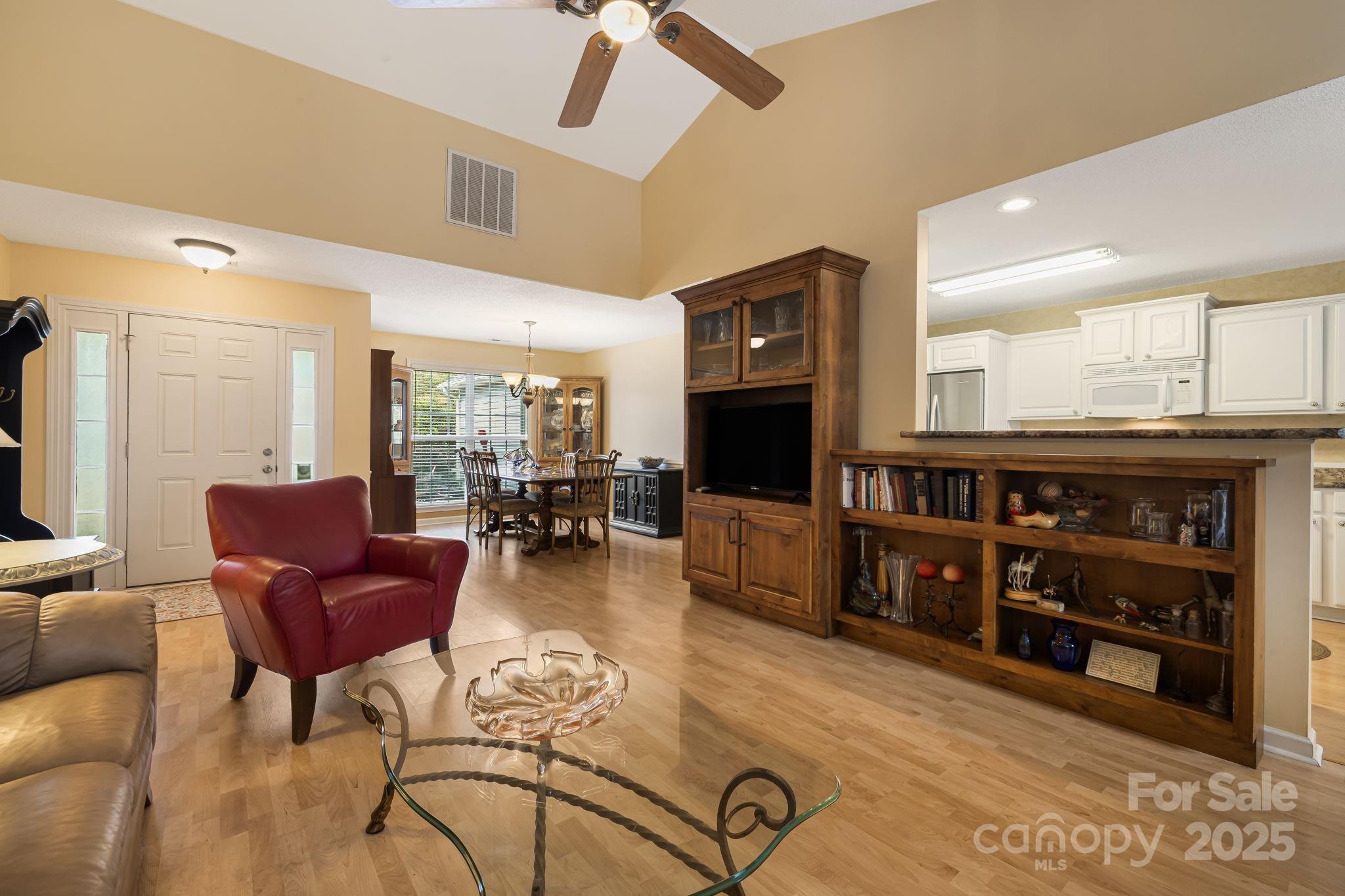 107 South Sunberry Trail Fletcher, NC 28732 - Photo 7 of 30 a living room with furniture and a flat screen tv