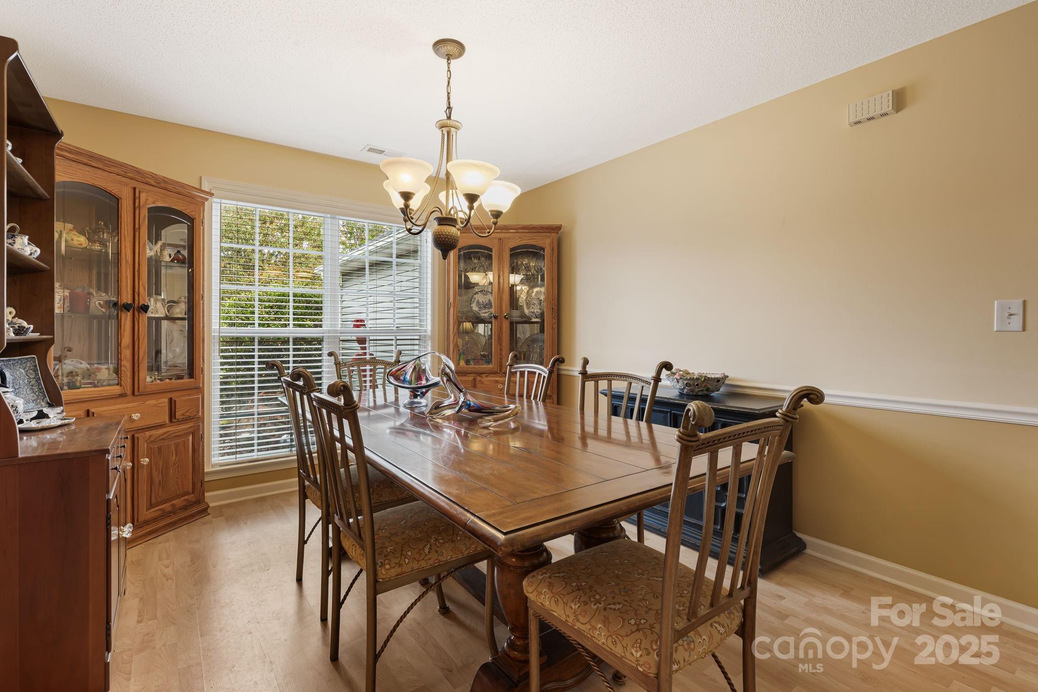 107 South Sunberry Trail Fletcher, NC 28732 - Photo 8 of 30 a view of a dining room with furniture window and outside view