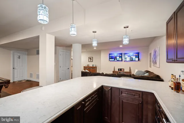 a kitchen with lots of counter space and a sink