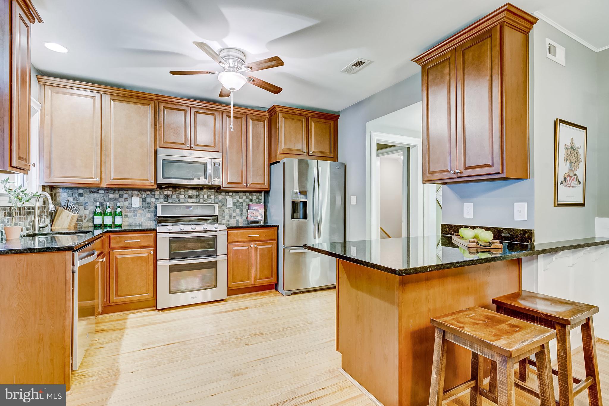 8 Somerset Road Baltimore, MD 21228 - Photo 12 of 56 Remodeled Kitchen, granite counters, breakfast bar