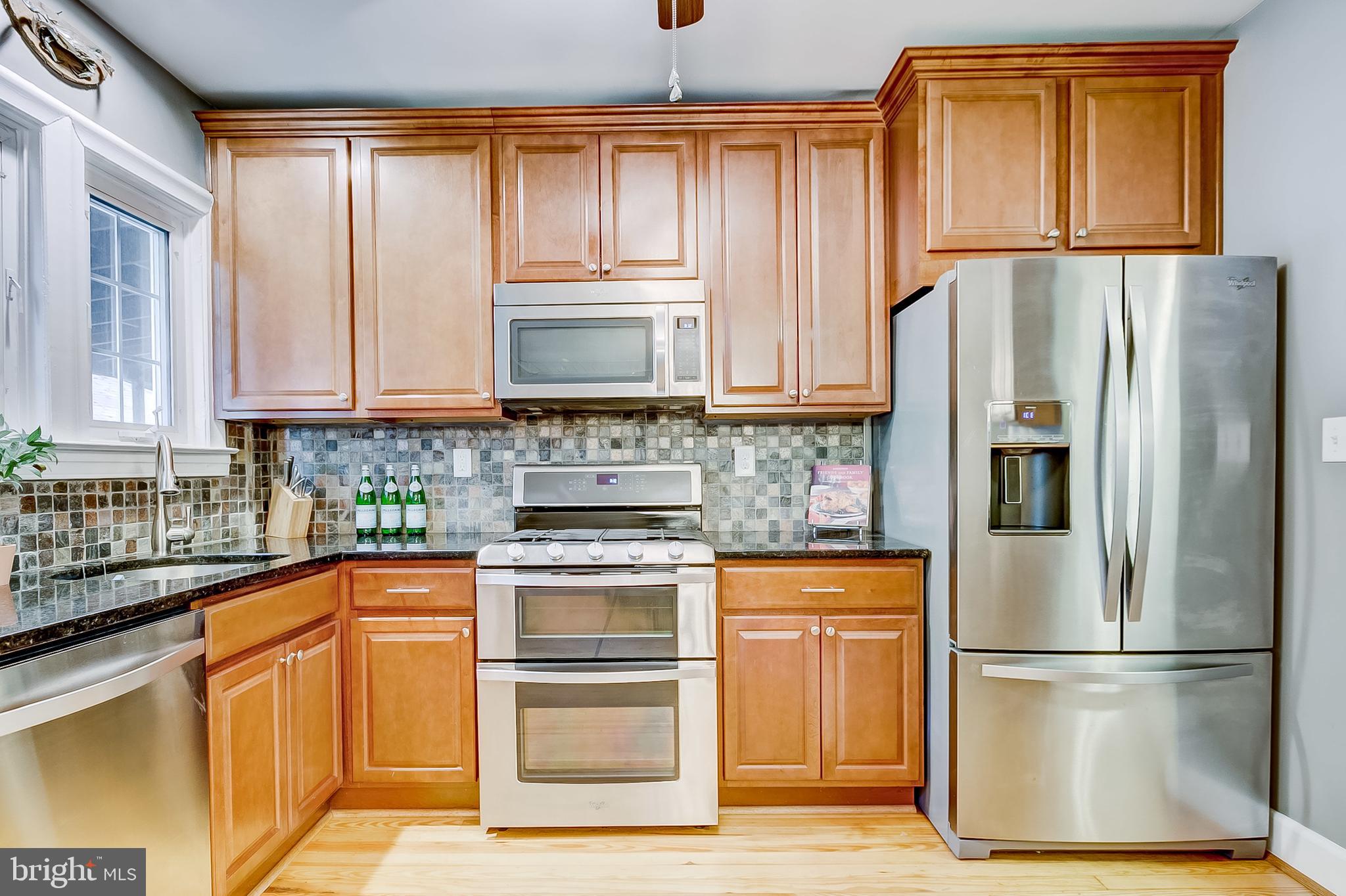 8 Somerset Road Baltimore, MD 21228 - Photo 13 of 56 High quality wood cabinets & tile backsplash 2015