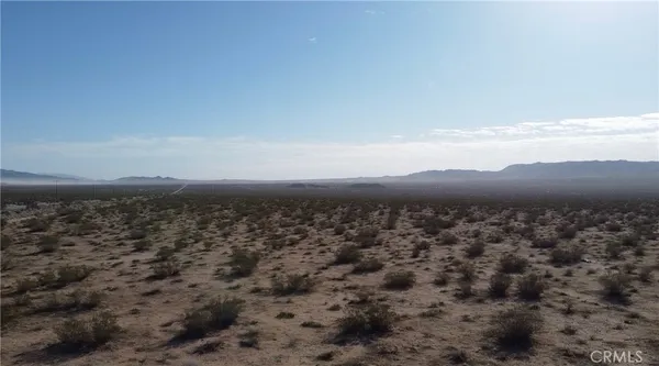 a view of a sky in view of mountains
