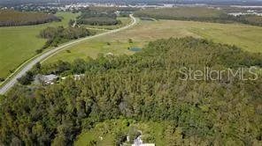 a view of a lake with a yard