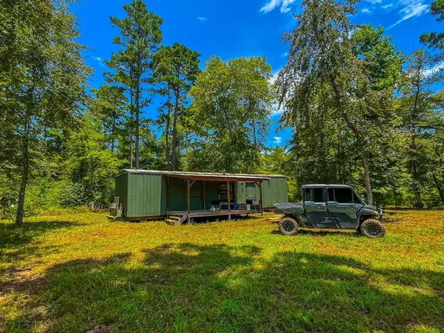 a view of a house with swimming pool