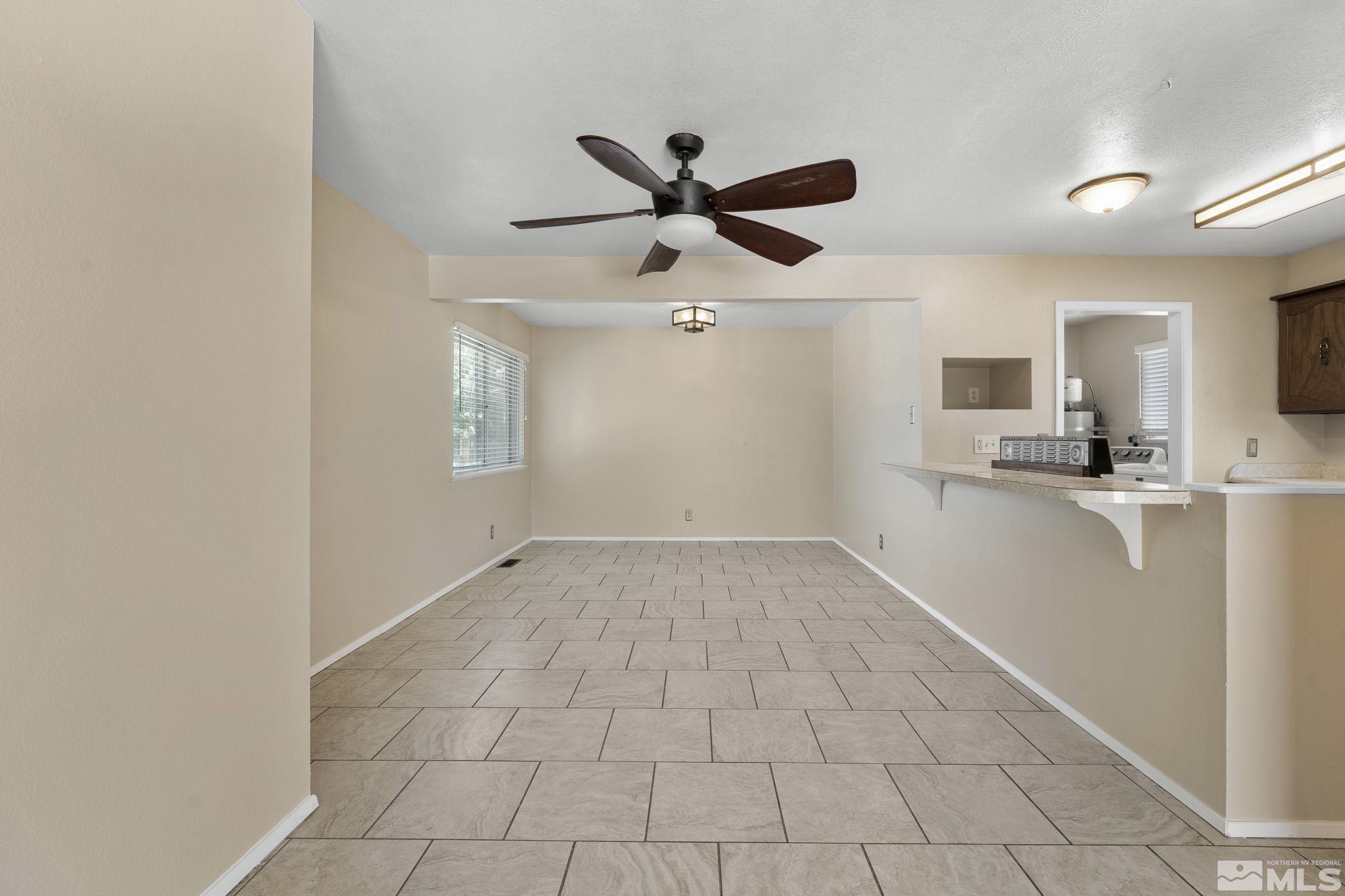 3475 Greta Place Reno, NV 89503 - Photo 13 of 36 a view of a kitchen with a sink and a window
