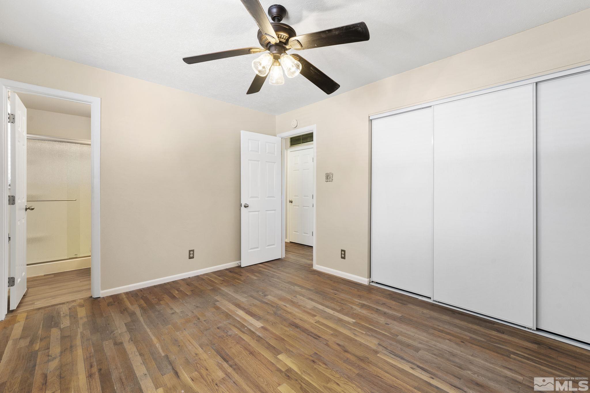 3475 Greta Place Reno, NV 89503 - Photo 18 of 36 a view of an empty room with wooden floor