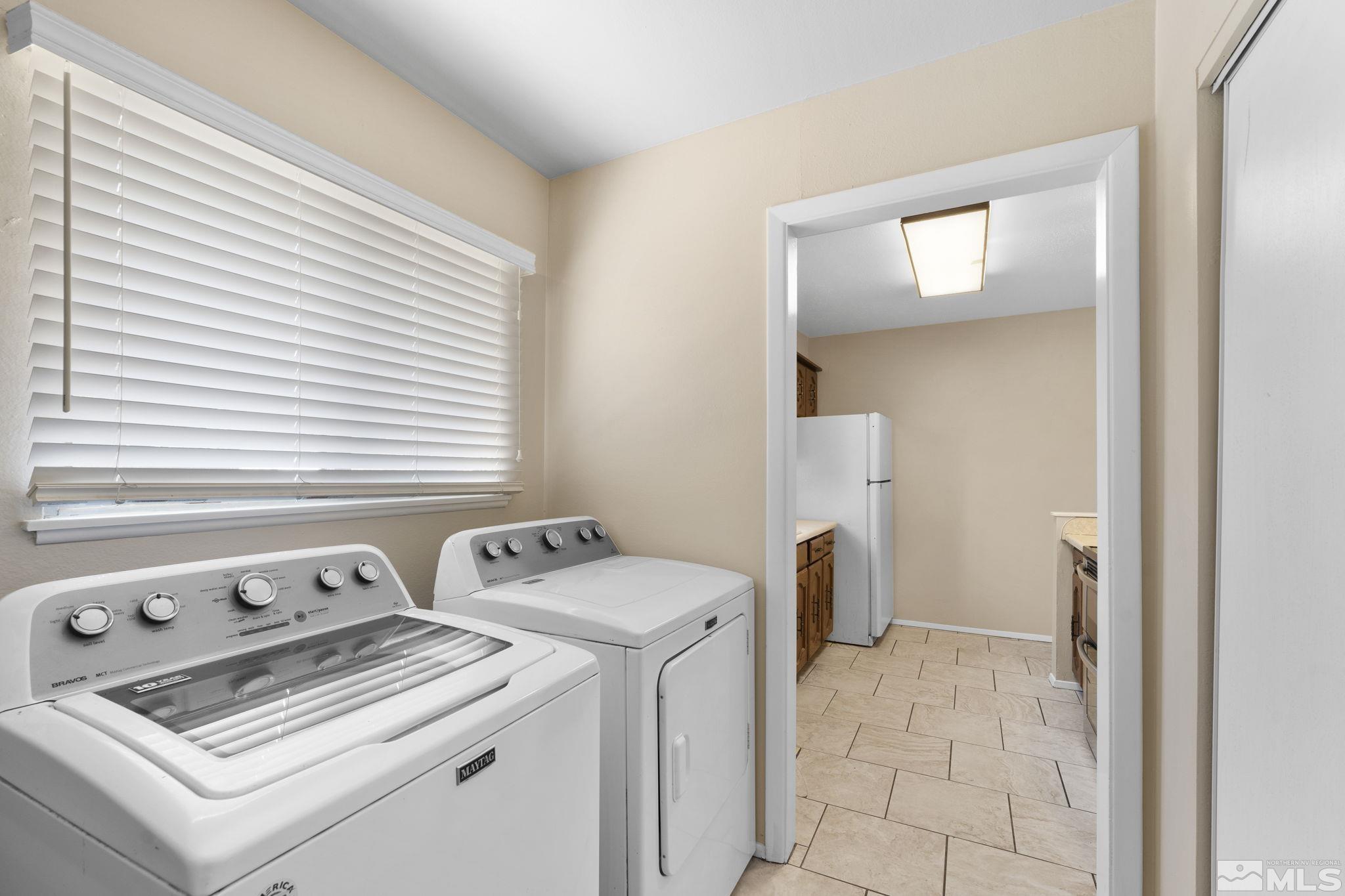 3475 Greta Place Reno, NV 89503 - Photo 25 of 36 a utility room with dryer and washer