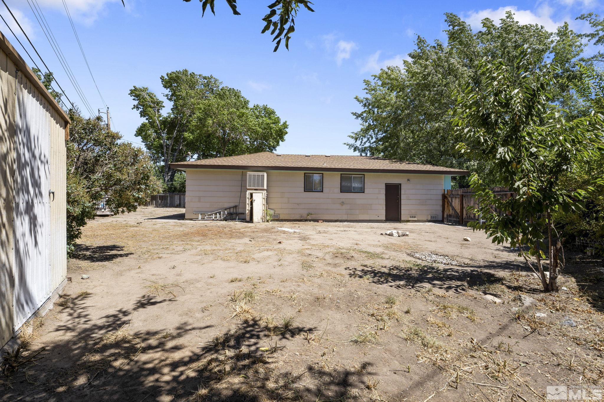 3475 Greta Place Reno, NV 89503 - Photo 28 of 36 a front view of house with yard and trees around