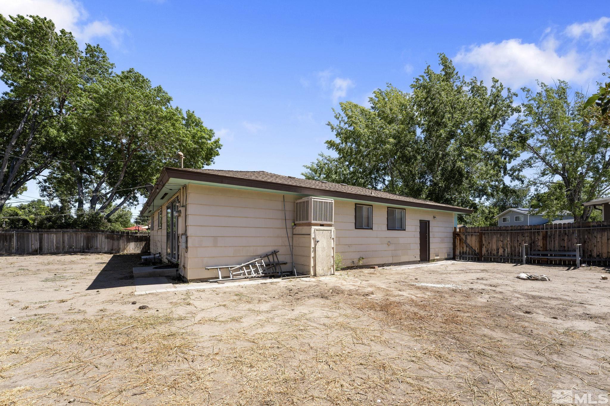 3475 Greta Place Reno, NV 89503 - Photo 29 of 36 a view of a house with a yard covered in snow