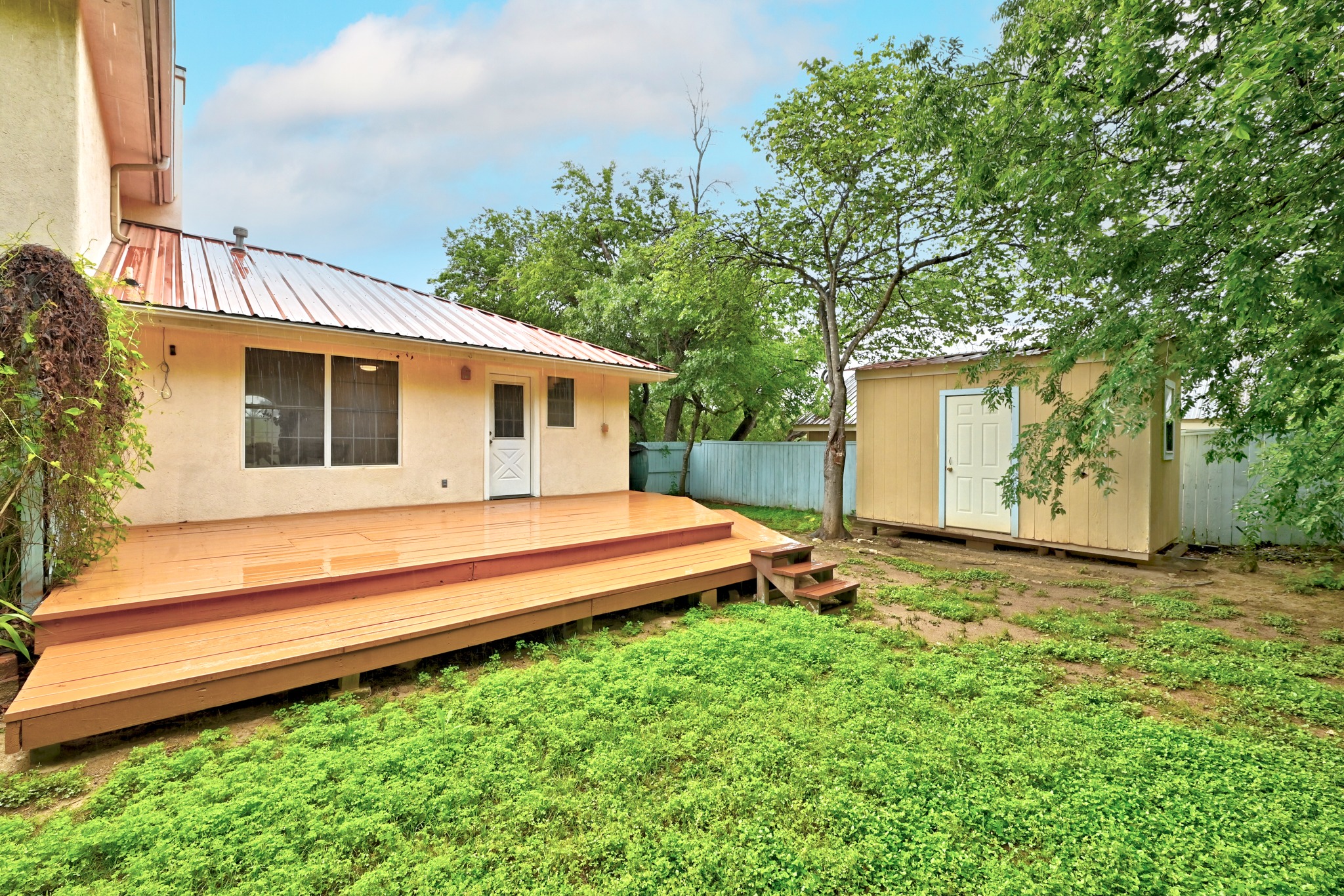 2405 Bahama Road Austin, TX 78733 - Photo 38 of 39 a view of a backyard with a garden and entertaining space