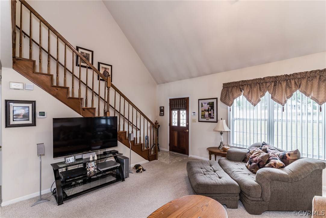 17445 Loving Union Road Disputanta, VA 23842 - Photo 11 of 50 a living room with furniture and a flat screen tv