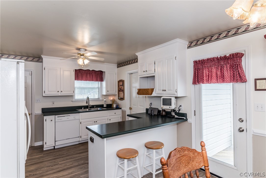 17445 Loving Union Road Disputanta, VA 23842 - Photo 17 of 50 a kitchen with stainless steel appliances granite countertop a sink stove and refrigerator