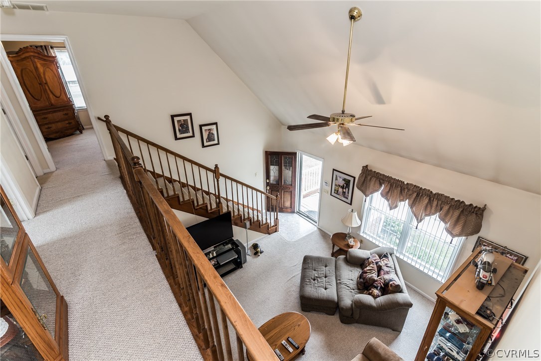 17445 Loving Union Road Disputanta, VA 23842 - Photo 26 of 50 a view of a livingroom with furniture hardwood floor and staircase