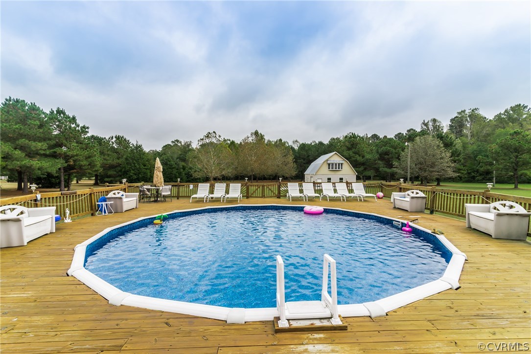17445 Loving Union Road Disputanta, VA 23842 - Photo 49 of 50 a view of swimming pool with seating space