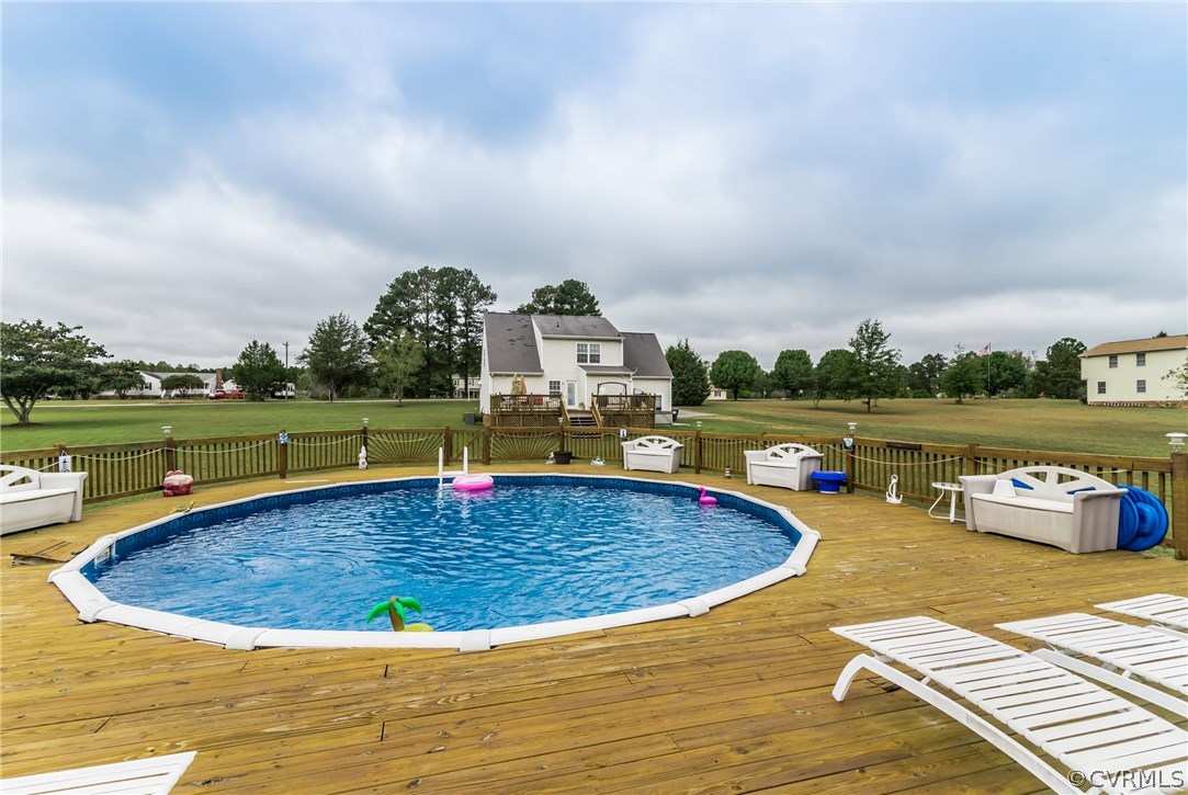 17445 Loving Union Road Disputanta, VA 23842 - Photo 50 of 50 a view of a swimming pool with a patio