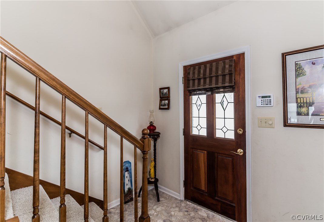 17445 Loving Union Road Disputanta, VA 23842 - Photo 8 of 50 a view of an entryway with wooden floor and windows
