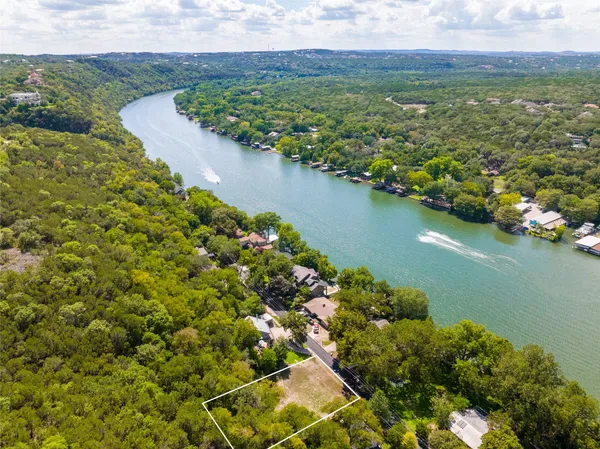 a view of a lake with a houses