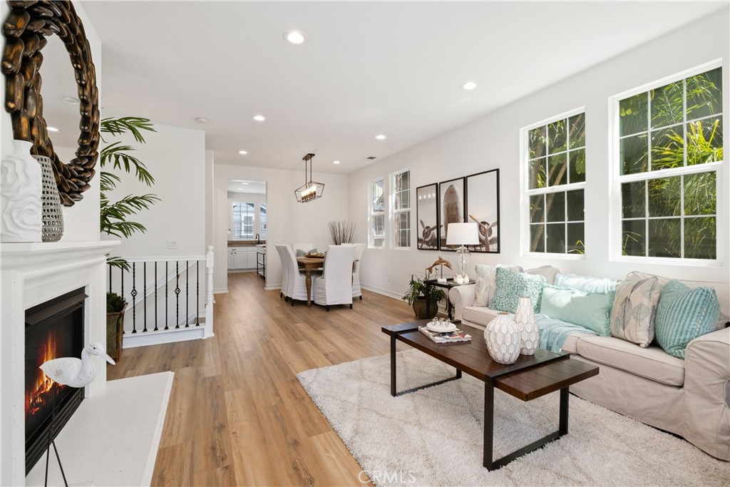 27 Reese Creek Ladera Ranch, CA 92694 - Photo 13 of 40 a living room with furniture and a fireplace
