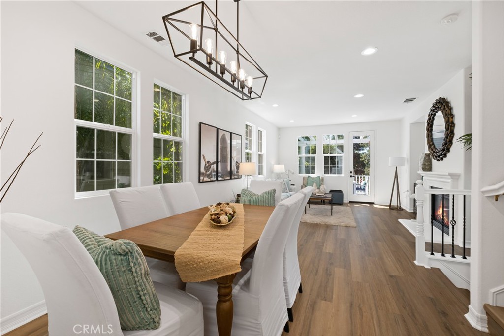 27 Reese Creek Ladera Ranch, CA 92694 - Photo 15 of 40 a view of a dining room with furniture window and wooden floor