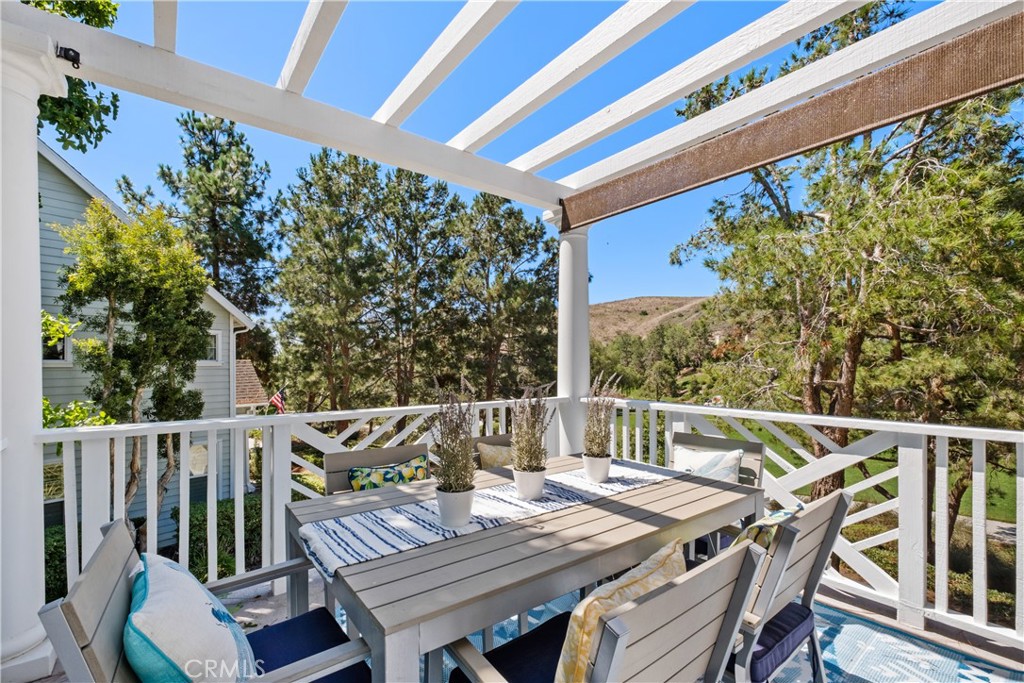 27 Reese Creek Ladera Ranch, CA 92694 - Photo 17 of 40 a view of deck with furniture and trees