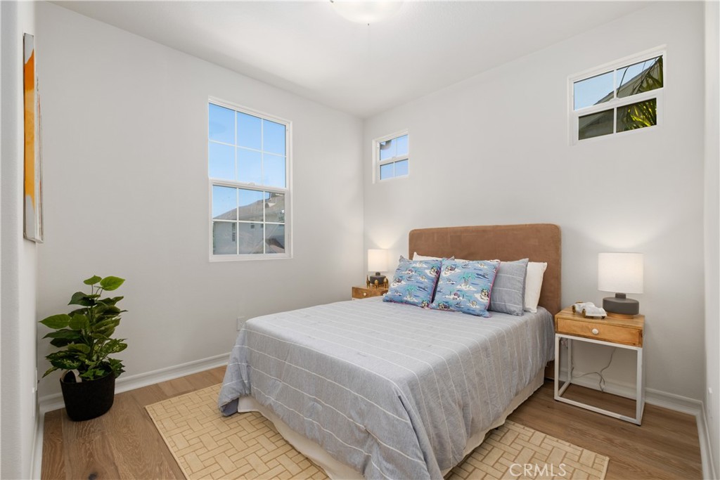 27 Reese Creek Ladera Ranch, CA 92694 - Photo 29 of 40 a bedroom with a bed potted plant and a window