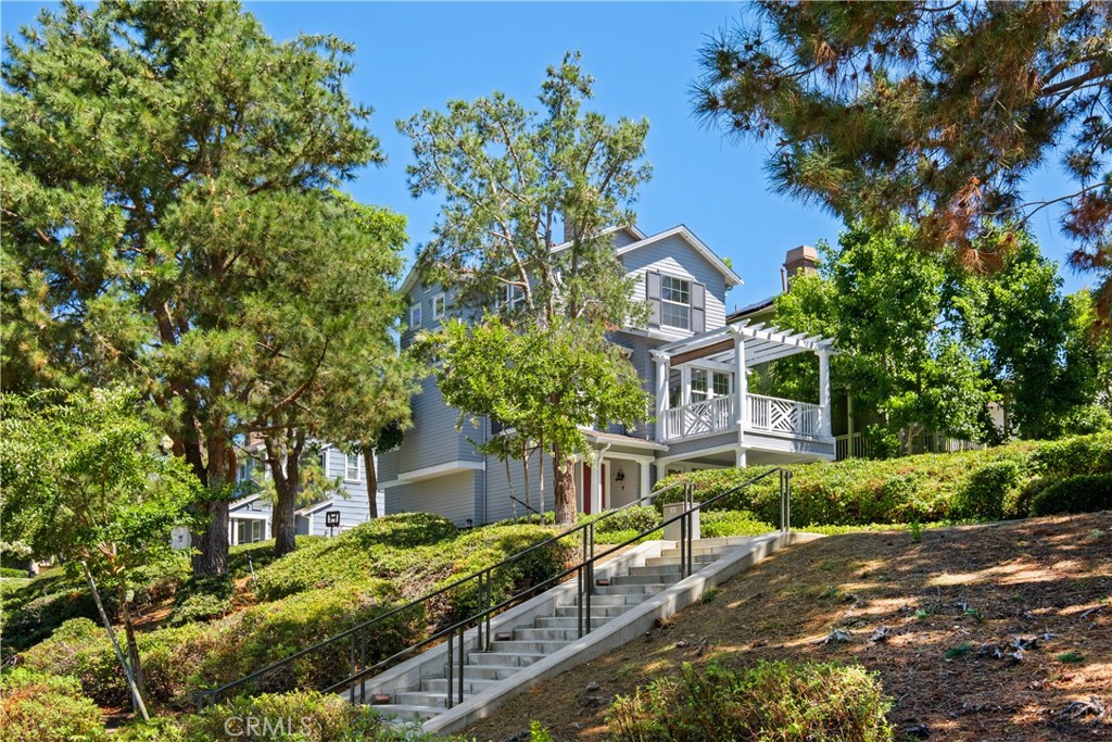 27 Reese Creek Ladera Ranch, CA 92694 - Photo 3 of 40 a front view of a house with a yard