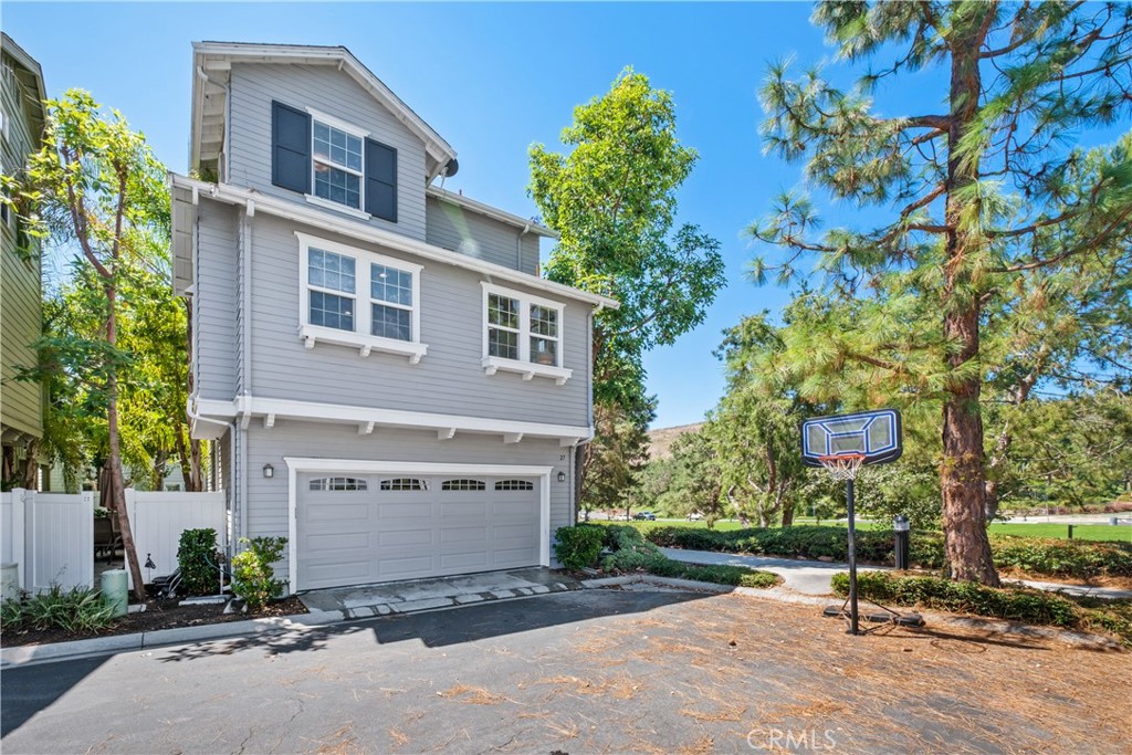 27 Reese Creek Ladera Ranch, CA 92694 - Photo 32 of 40 a front view of a building with garden